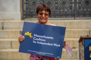 Supporters of the Massachusetts Coalition for Independent Work gather at the State House on August 3, 2021. Photo by Bethany Versoy.